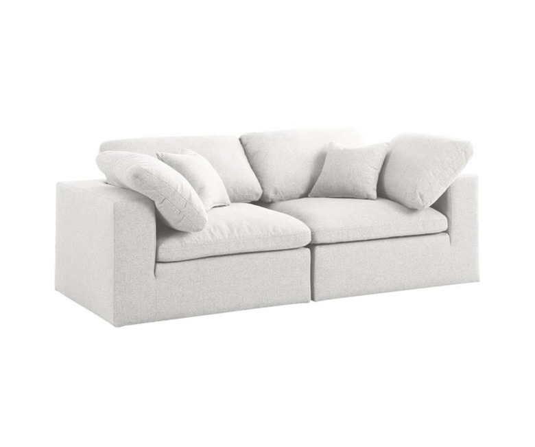 white two-seater sofa