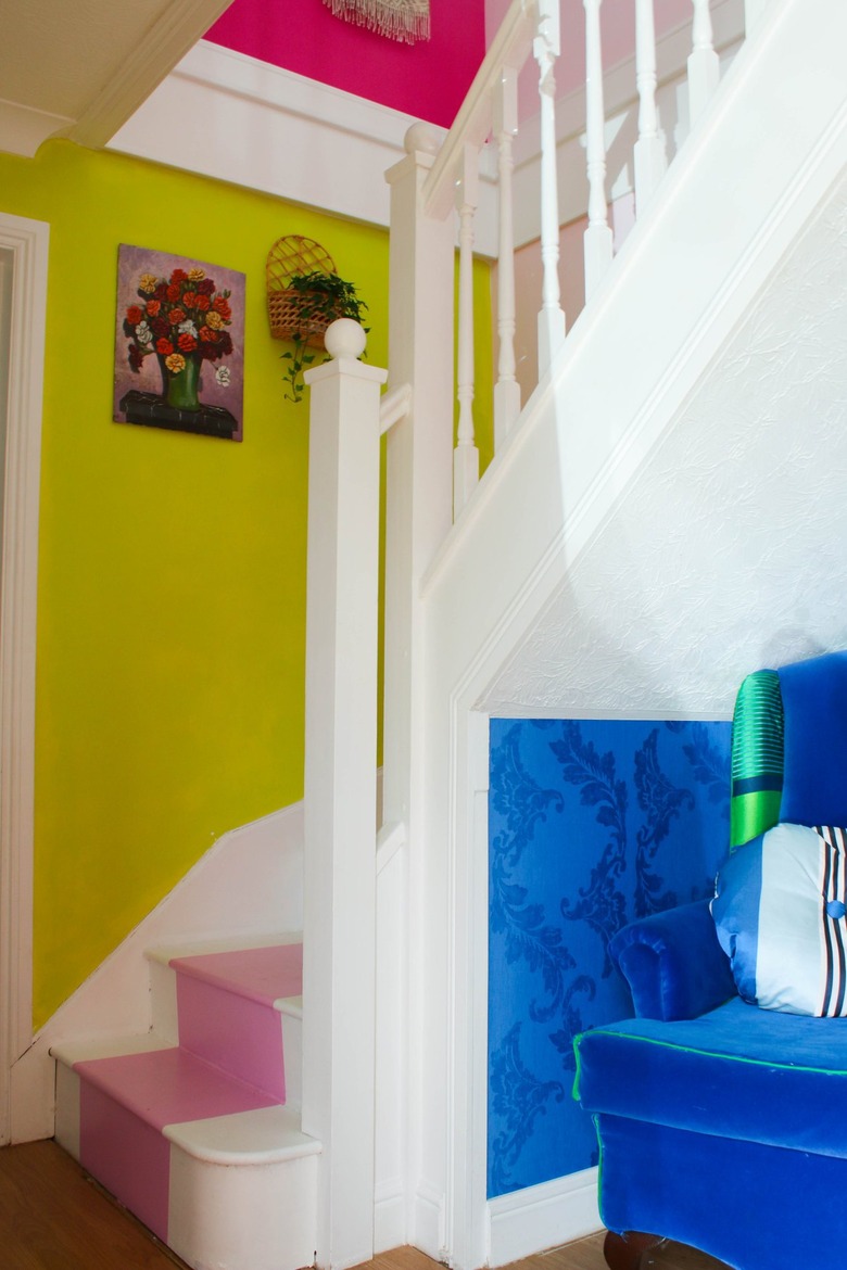 bright yellow accent wall on staircase