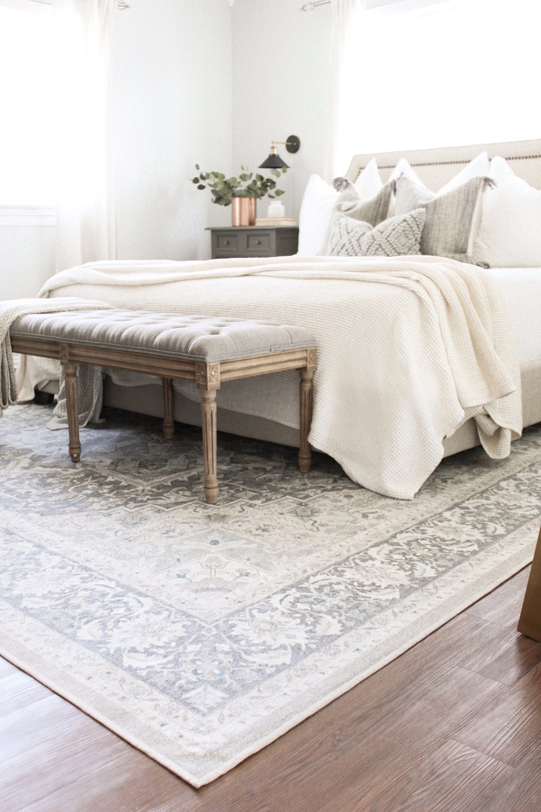 well-decorated bedroom with rug