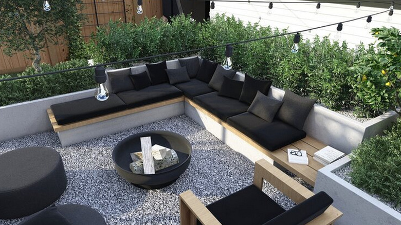 Backyard seating area with string lights