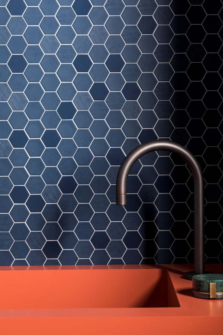 blue hex mosaic kitchen backsplash with coral sink