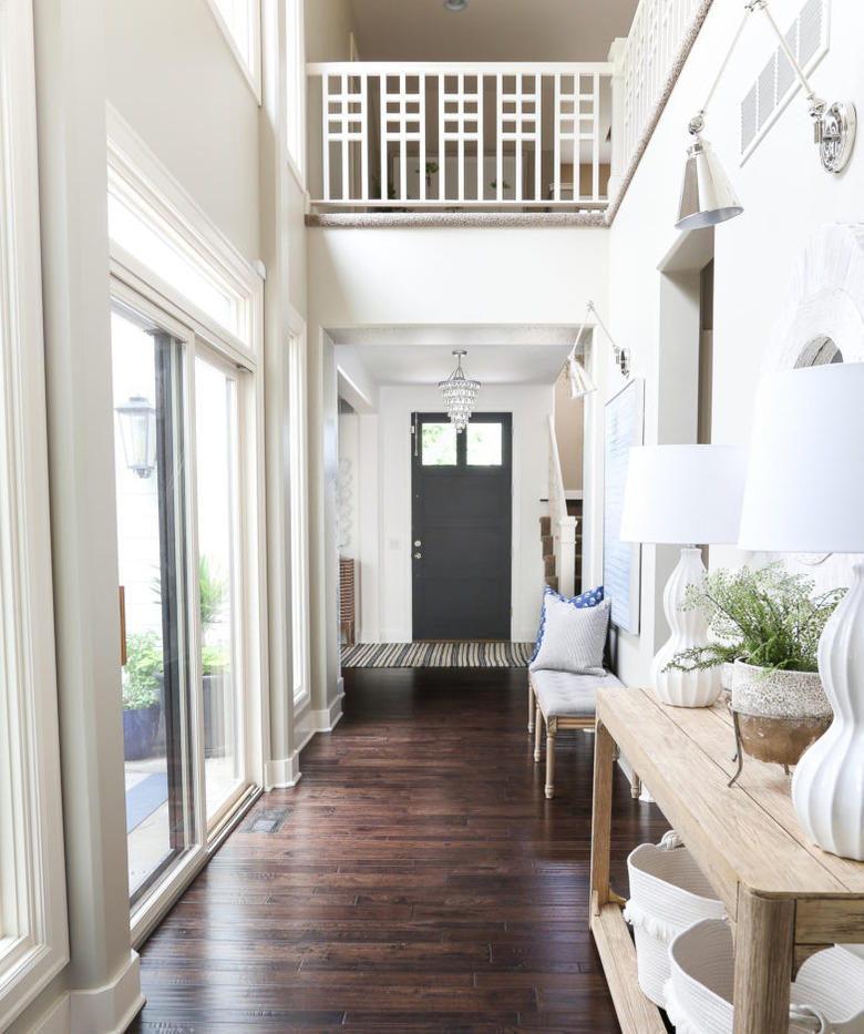 hallway with wood flooring in varying sizes