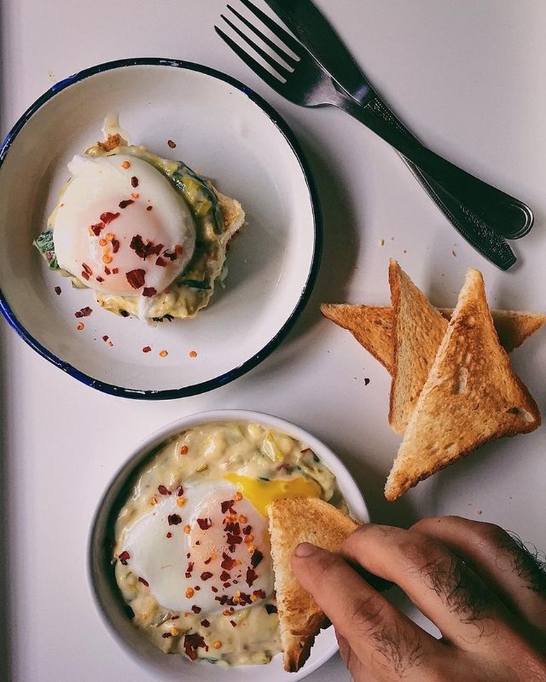 Belly Over Mind Spinach and Leek Béchamel With Poached Eggs