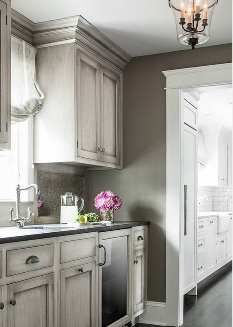 distressed cabinets in gray kitchen