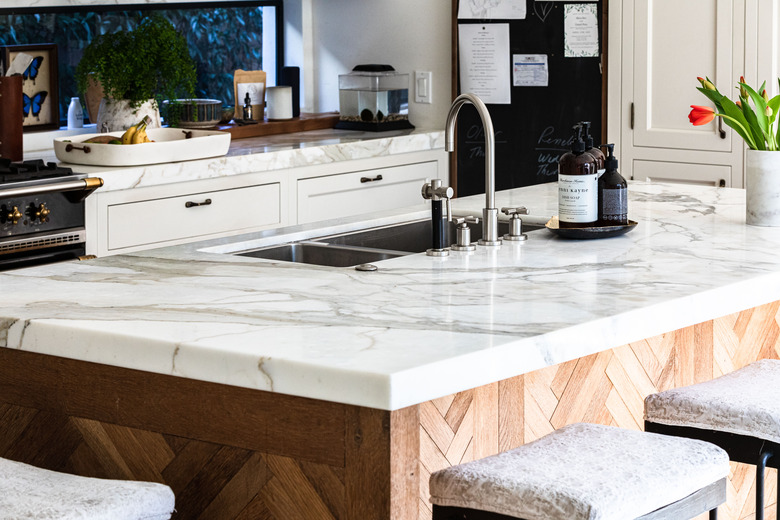 kitchen marble countertop on kitchen island with sink with high-arc faucet