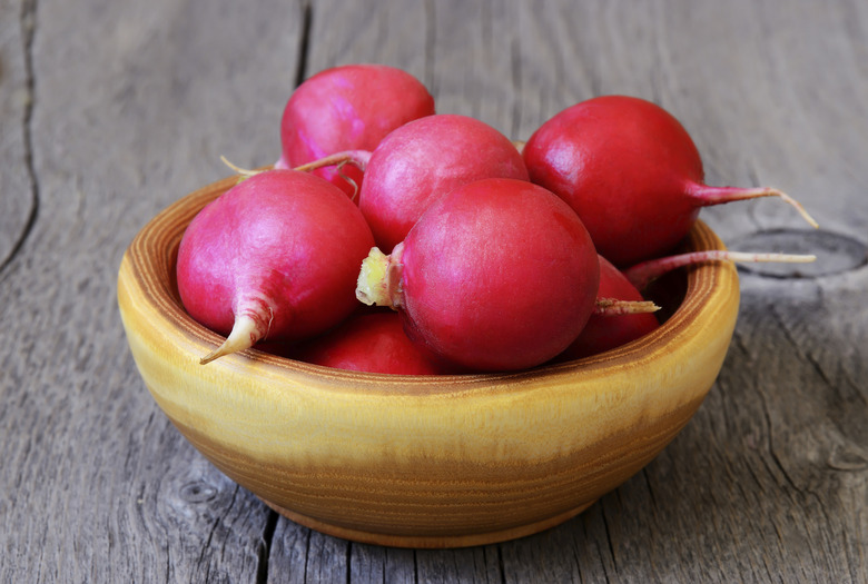 Radish in a brown bowl