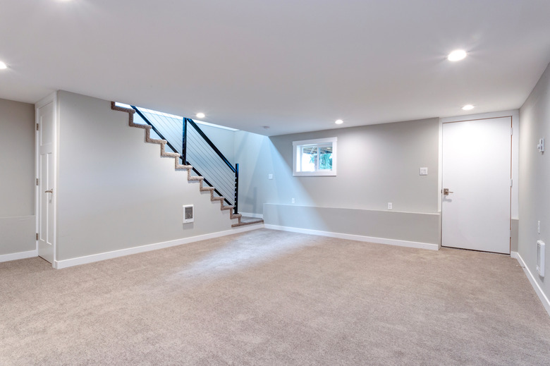 Light spacious basement area with staircase.