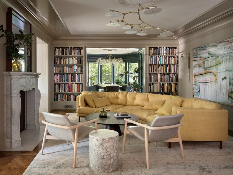 taupe living room with yellow sofa