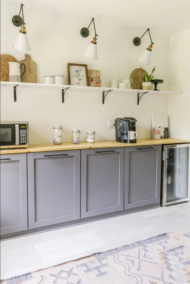 modern butler's pantry with lavender cabinets and open shelving