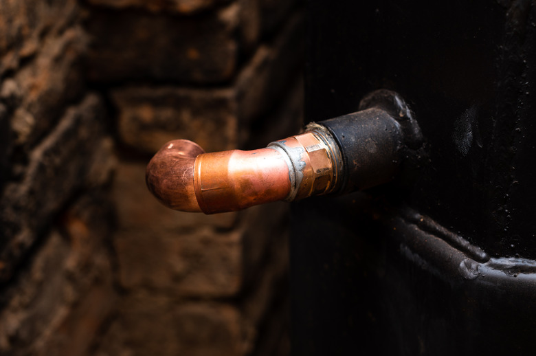 Installation of copper pipes for water supply to the fireplace.