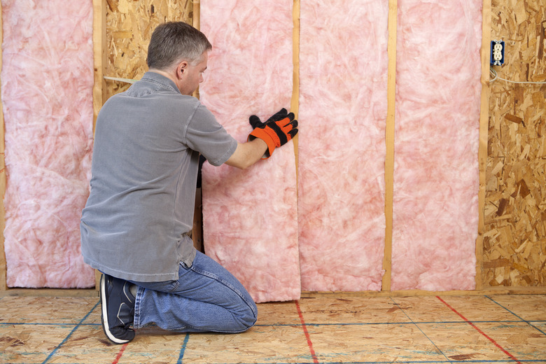 Man Installing Insulation