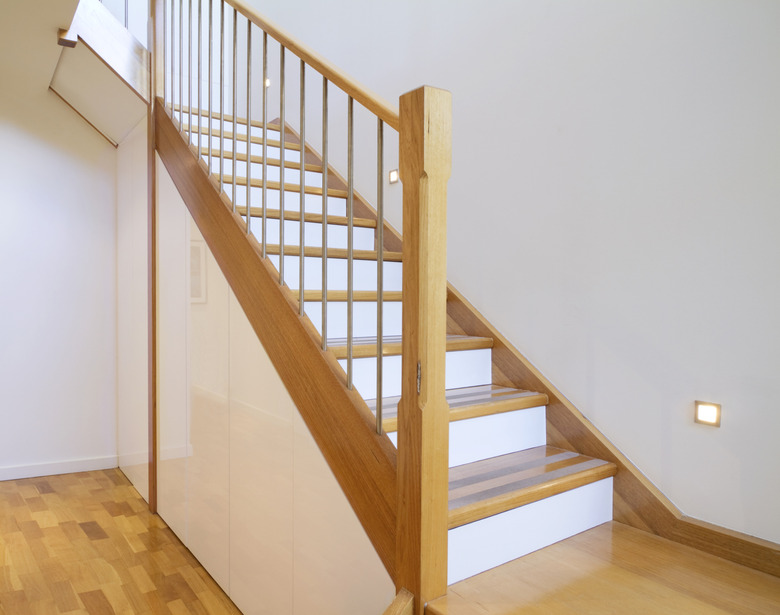 Oak and white stair case home interior