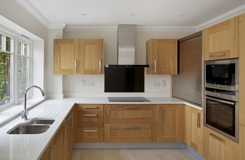 oak fitted apartment kitchen