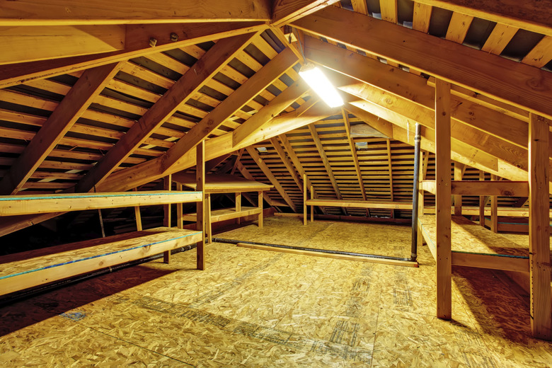 Empty attic with storage shelves