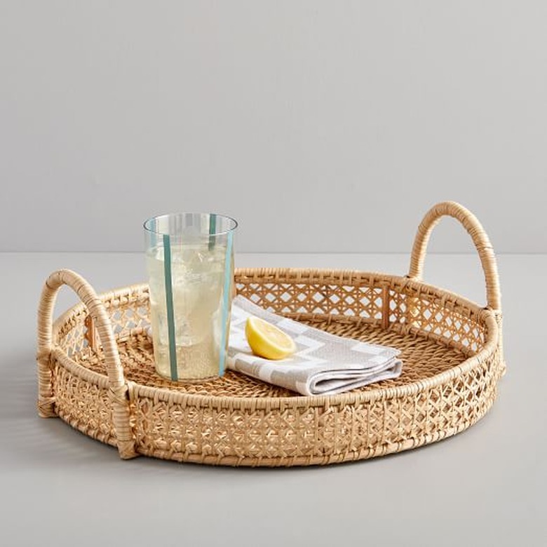 rattan tray with a beverage and napkin