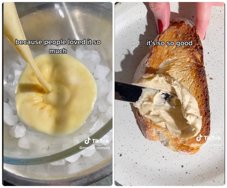 Hand spreading homemade whipped brown butter onto toast