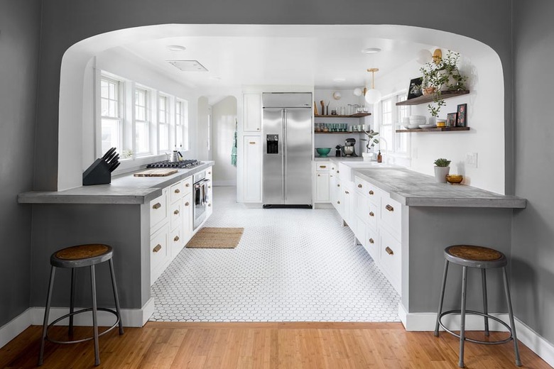 Seattle kitchen with white kitchen floor tiles and stainless steel fridge