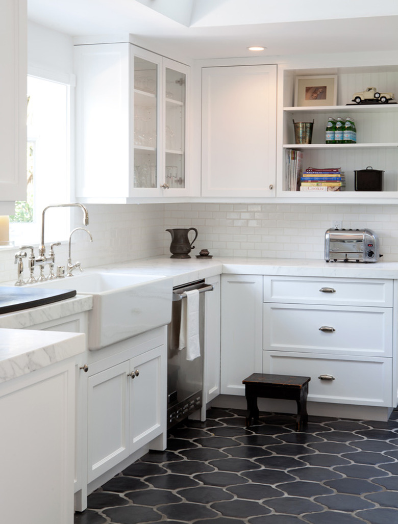 Spanish style bungalow white kitchen dark floors