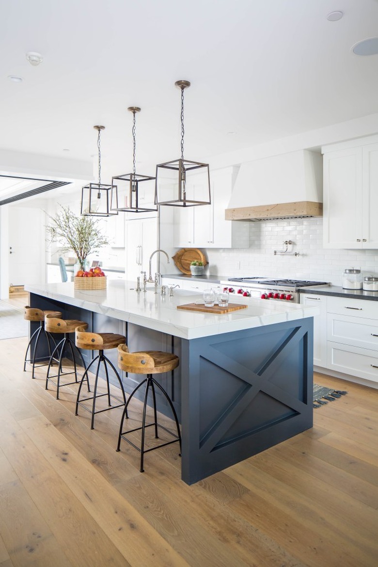 white industrial kitchen with dark island