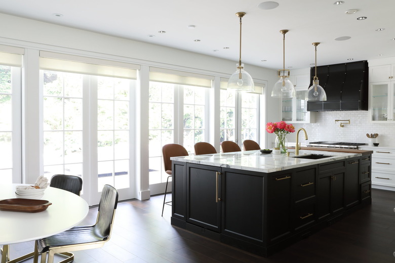 black kitchen island with marble top