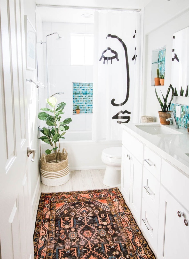 White Tile shower with blue inset