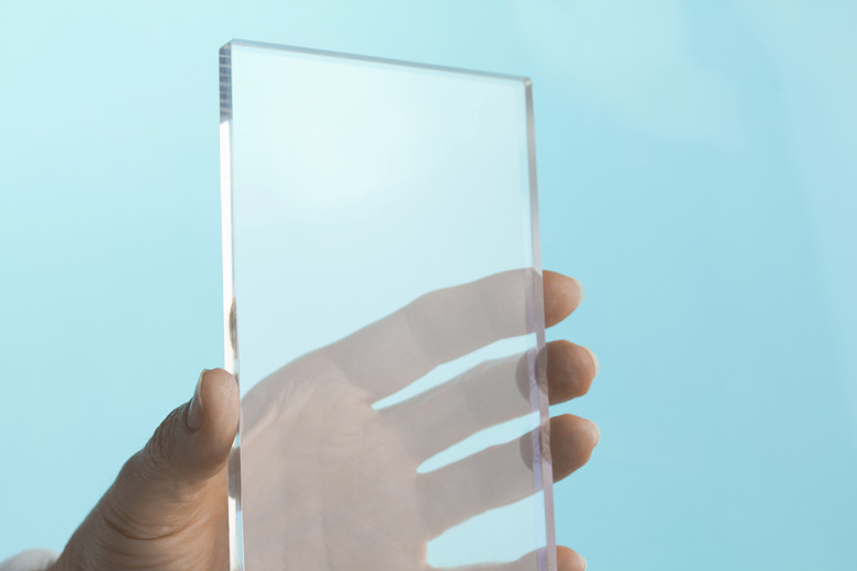 Transparent Blank Future Mini Computer Tablet Phone in Hand