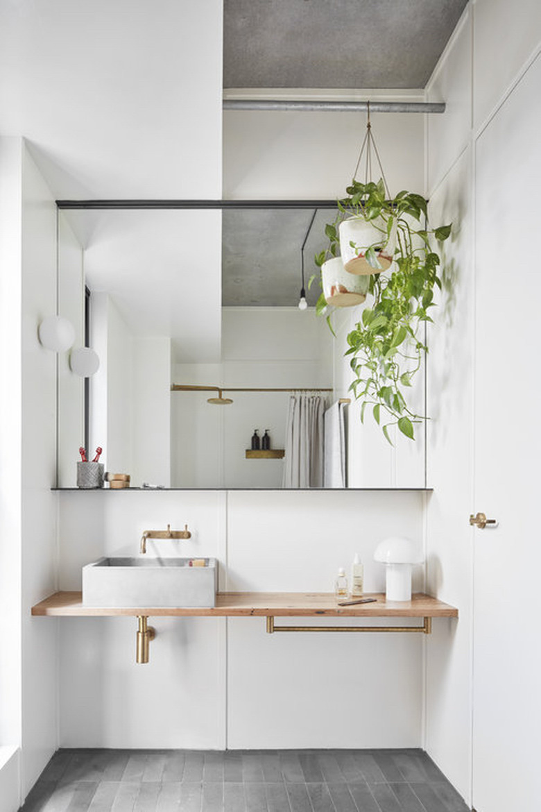 floating wood countertop in bathroom