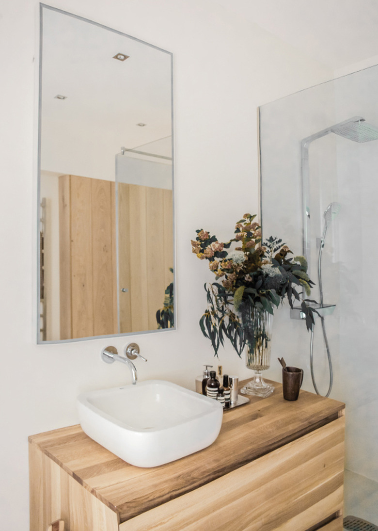 wood countertop and vanity cabinet with vessel sink