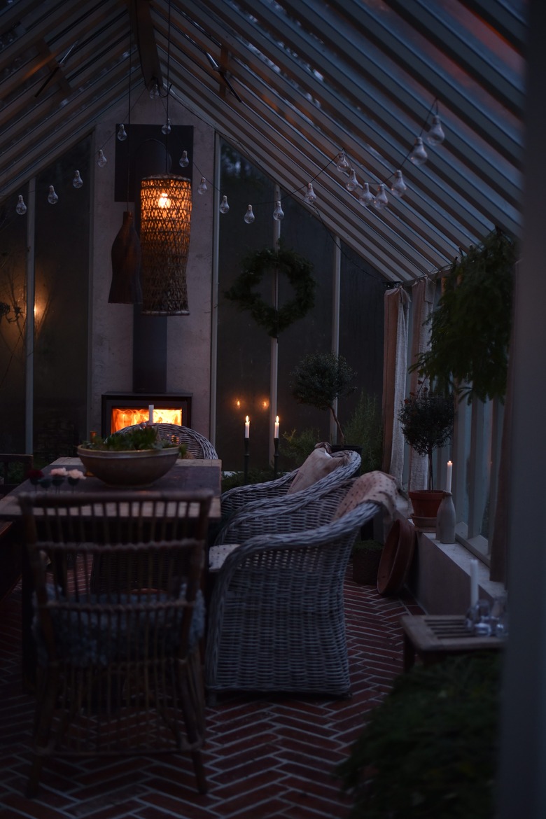 Swedish greenhouse with wood stove fireplace