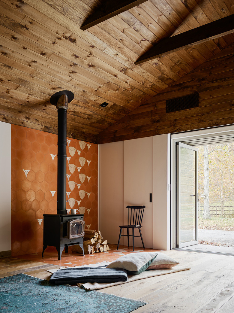 renovated barn with wood stove fireplace