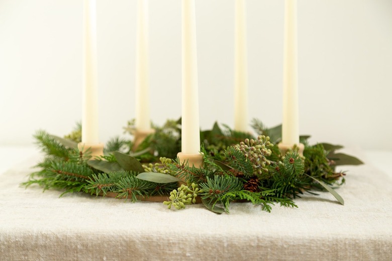 DIY Wreath Centerpiece Using Fresh Greenery and Candles Tutorial | Hunker