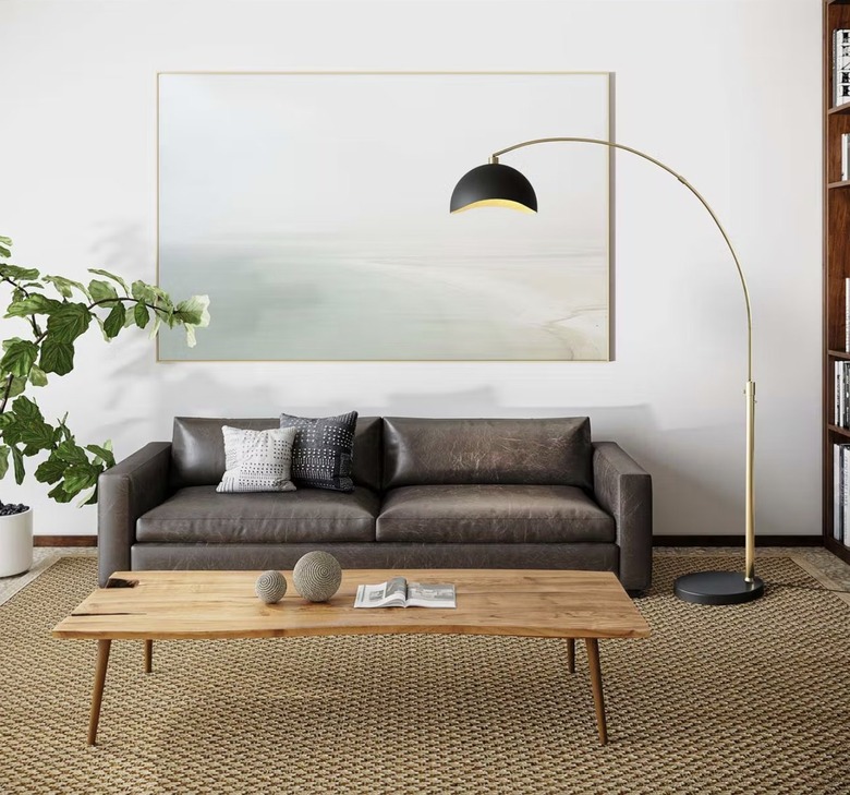 living room with arc lamp