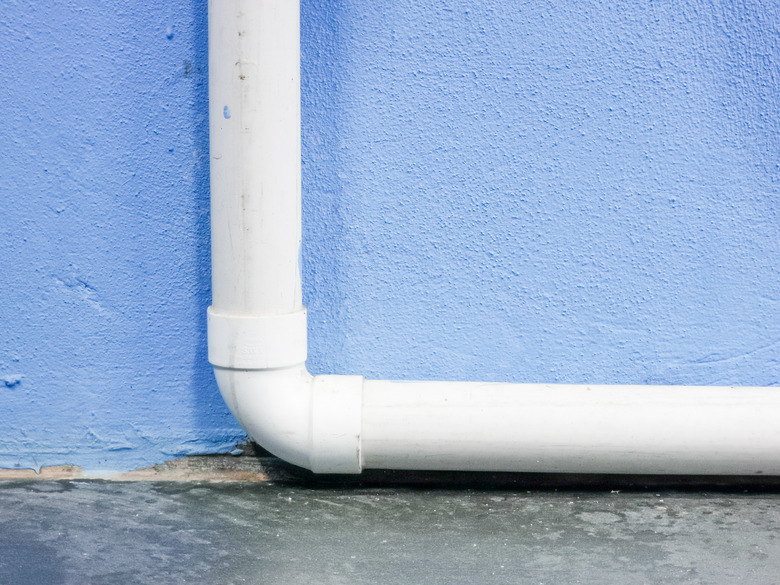 Close up image of sink pvc pipe drainage waste.