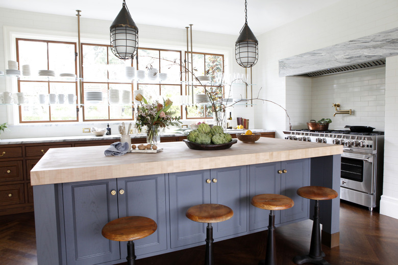 wood traditional kitchen cabinet doors in kitchen with blue island and wood bar stools