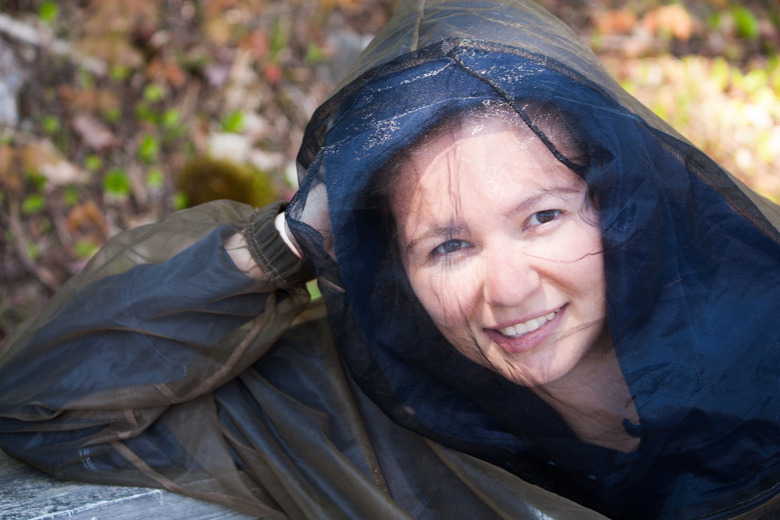 Young woman wears bug hood