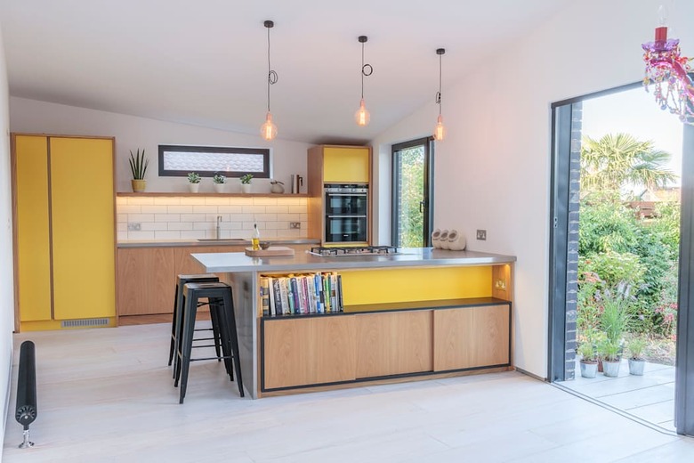 Minimal Scandinavian yellow kitchen color idea with wood cabinets