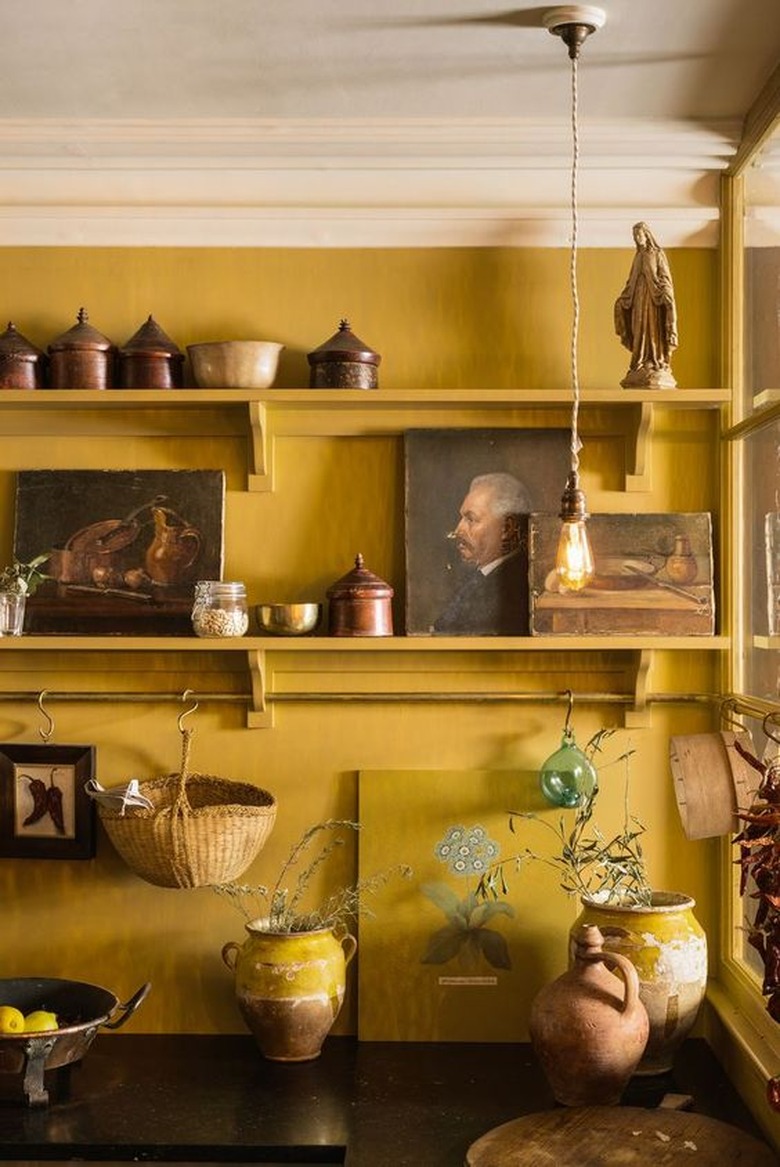 Turmeric yellow kitchen color idea with yellow shelving