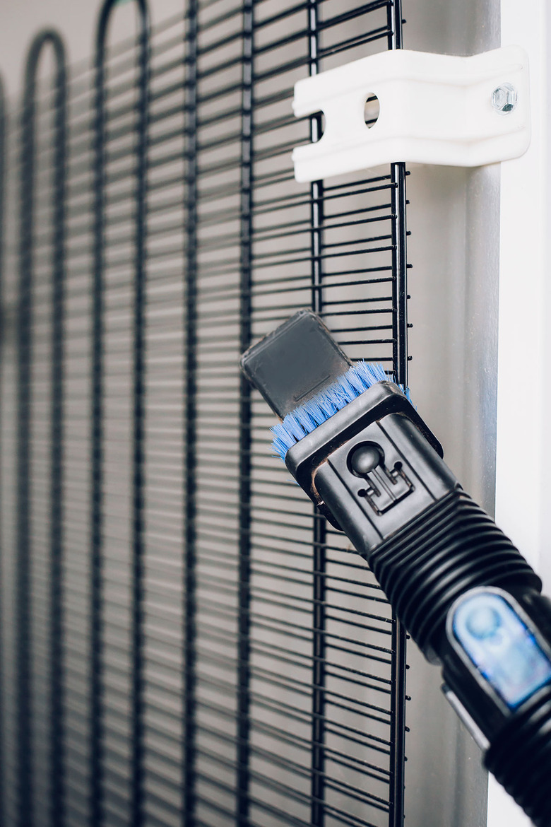 Cleaning fridge coils