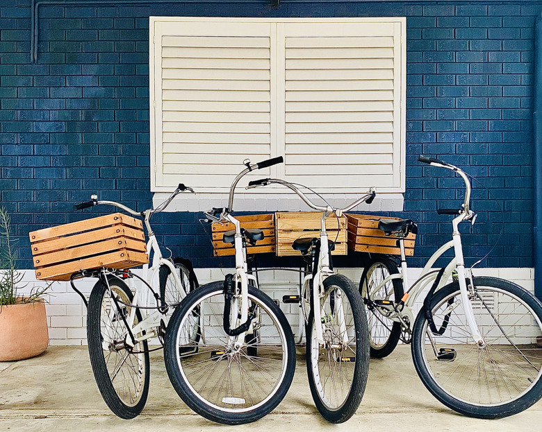 Parked Pushbikes with Box Baskets