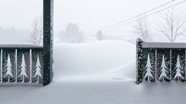 Porch covered in snowfall