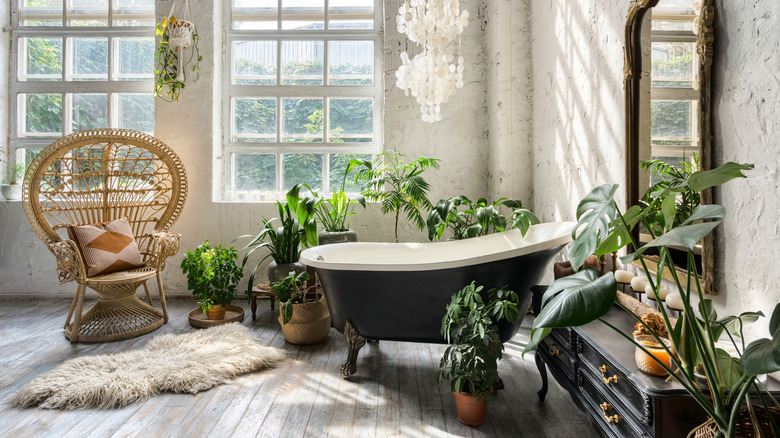 green bathroom idea with herringbone wood flooring