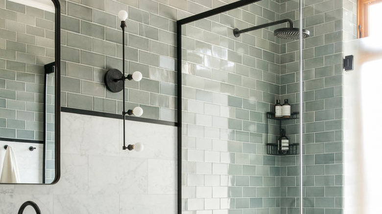 green bathroom idea with glass shower enclosure