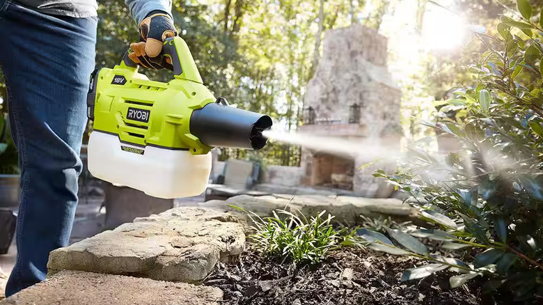 Ryobi battery-operated fogger in use outdoors