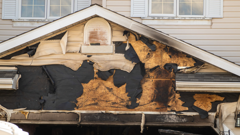 burnt wooden home