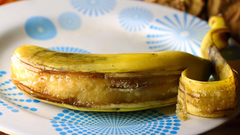 Overripe banana in shallow dish