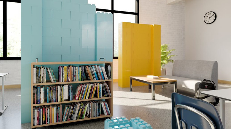 a blue wall in a library made of plastic blocks