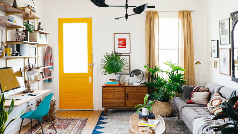 living room with yellow front door