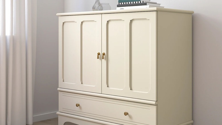 image of beige IKEA LOMMARP cabinet against a white wall