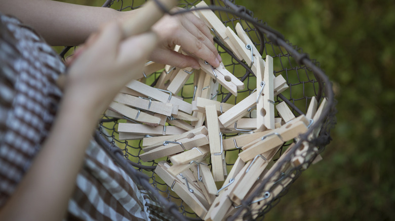 baset of wooden clothespins