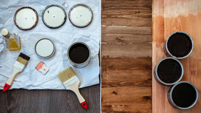 overhead shot of various stains and glazes on different types of wooden surfaces with a paintbrush